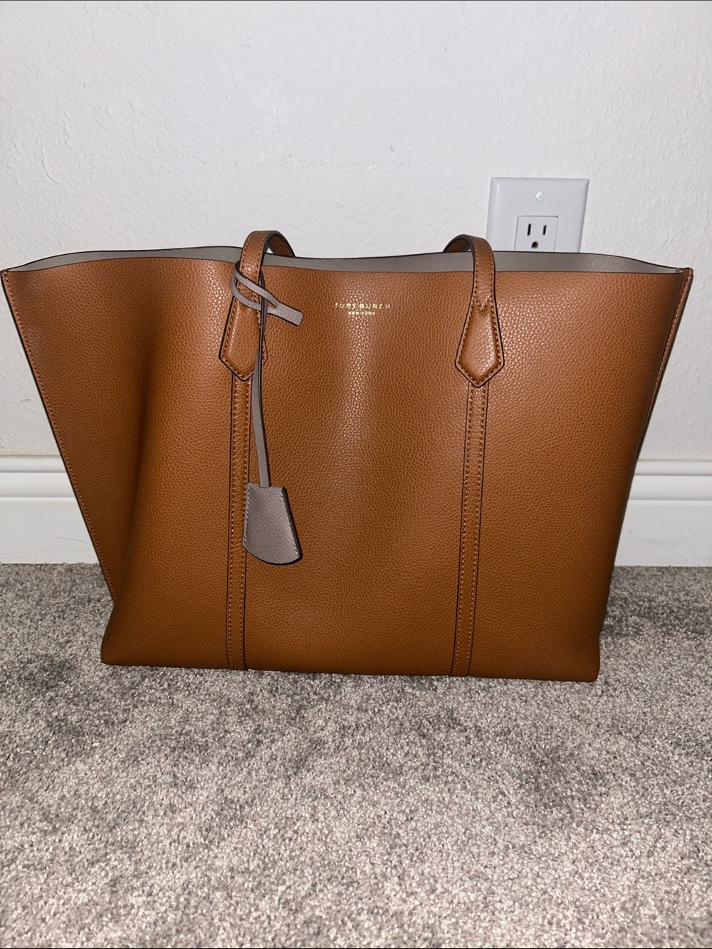 Tory Burch Cognac Pebbled Leather Tote with Taupe Tag Accents